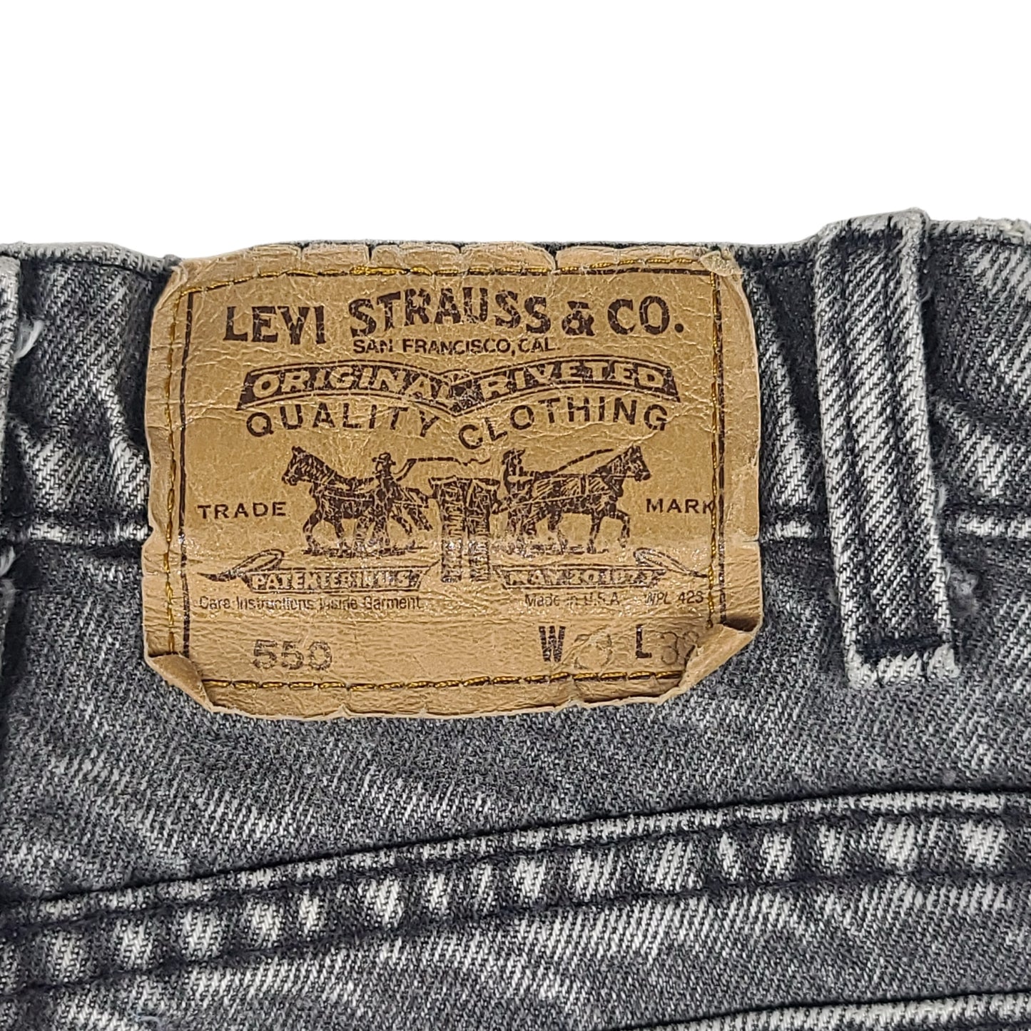 Vintage Levi's 550 Black Acid Washed Jeans