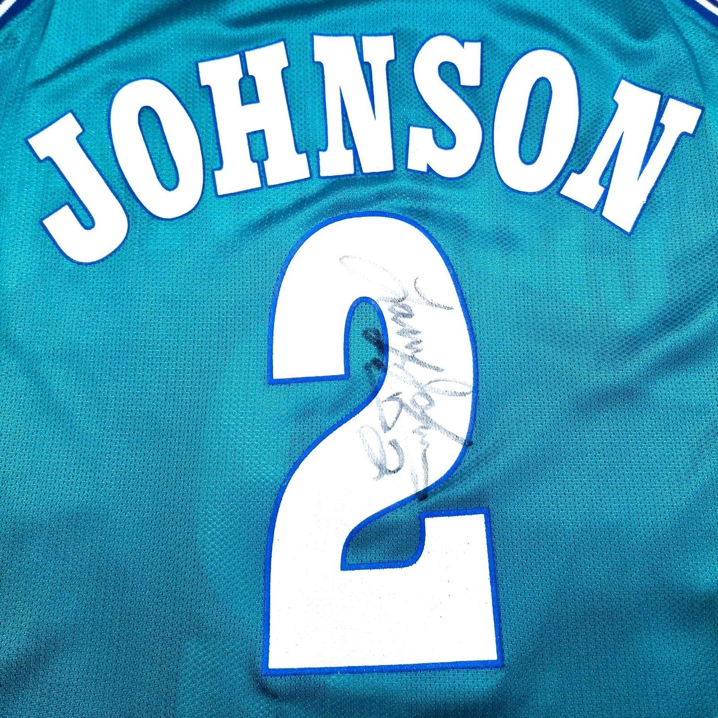 Larry Johnson Autographed Champion Jersey 36